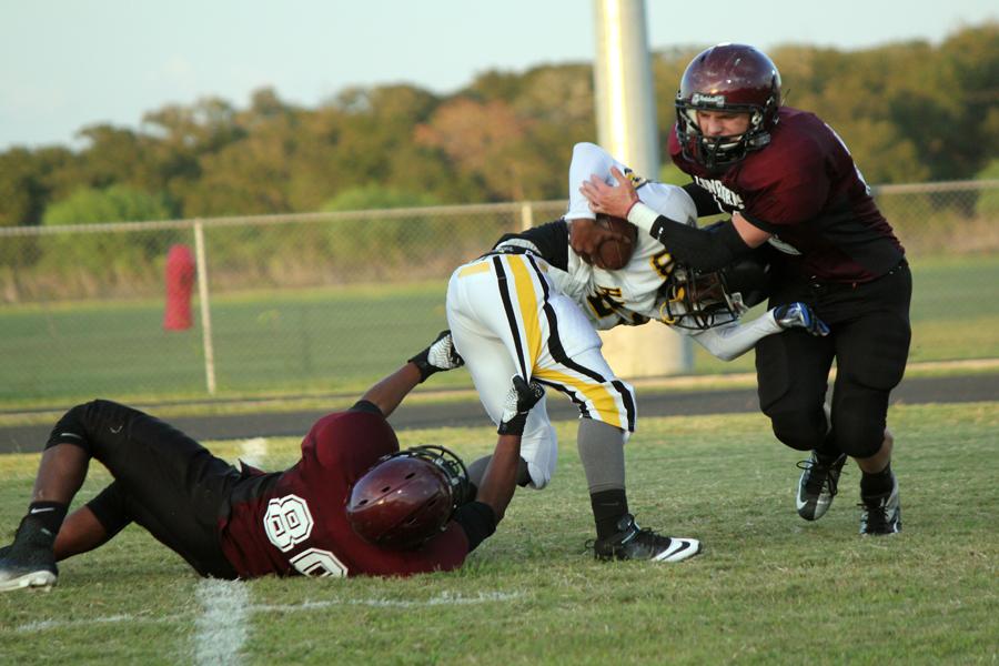 Number 32, Aaron Mcgee(Top) and Number 80, Christian Macias (Bottom) with the sack against Hastings