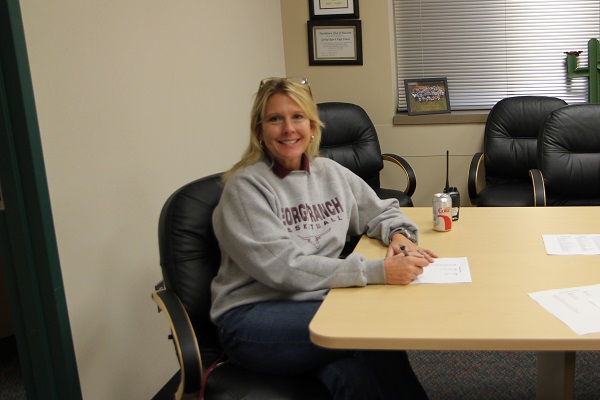 Mrs. Haack sits in her conference room, waiting for one of the many meetings she has to start. Photo by Arturo Compean. 