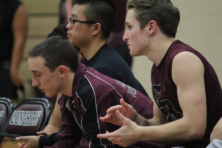 Alex Chartier, left, sitting next to his brother Cory 