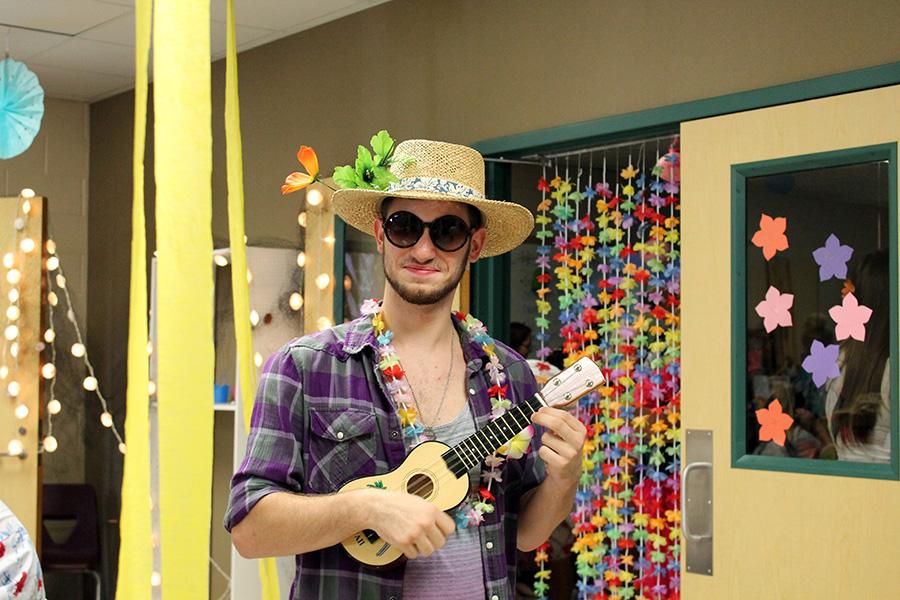 Senior Ryan Knoles really getting into the spirit of Hawaiian day, ukelele and all