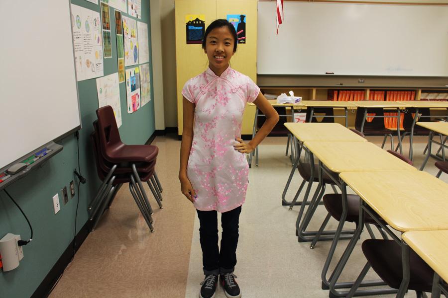 Ashley Cao in traditional Asian dress representing her culture.