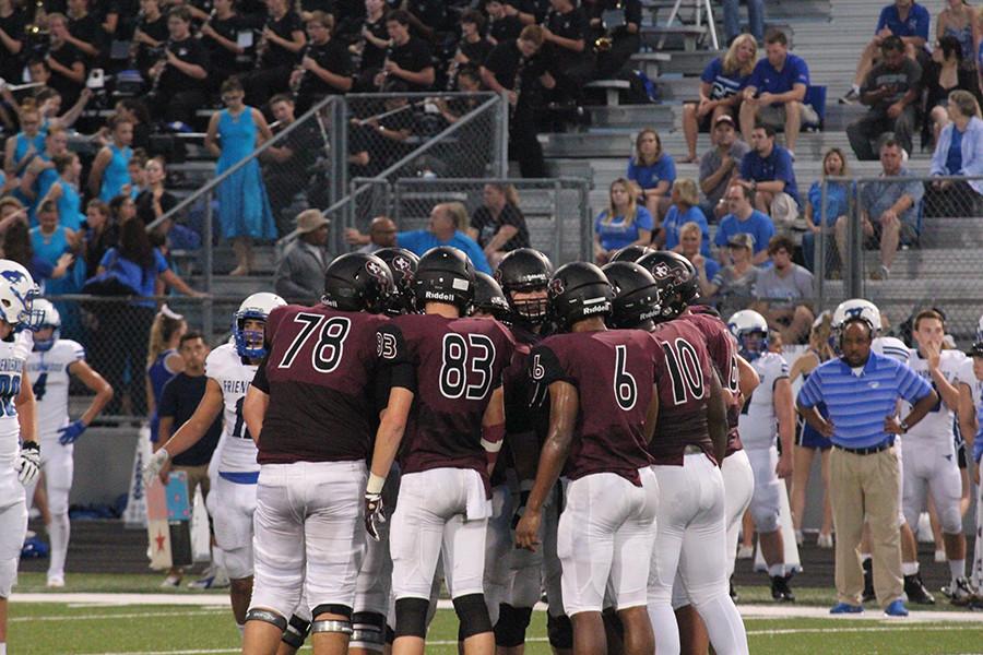 Longhorns huddle together