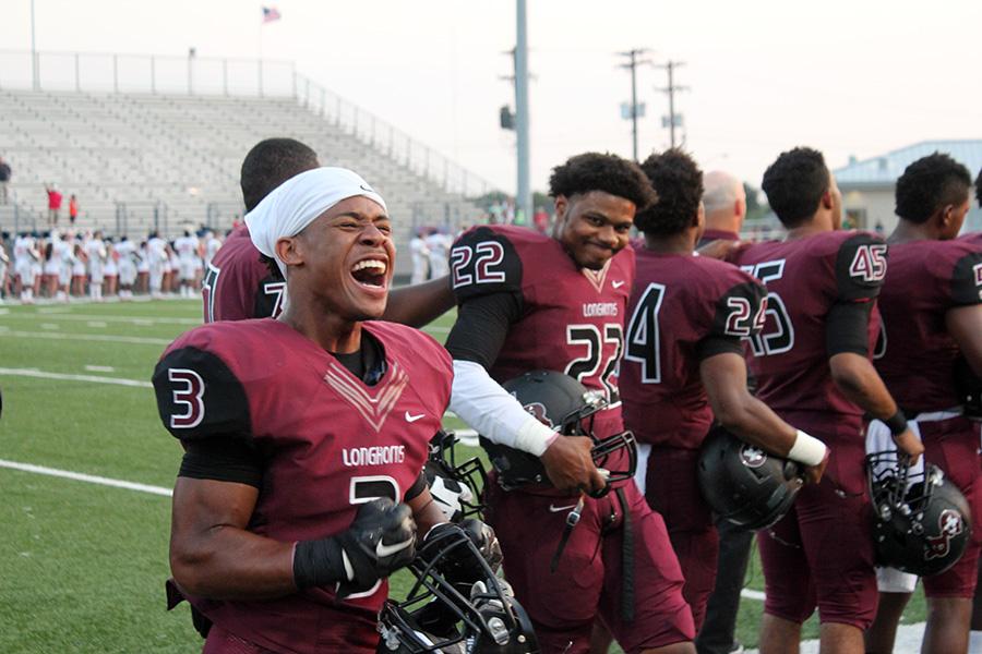 Scruggs cheers after the first touchdown