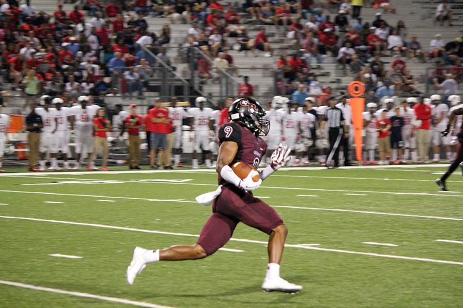 Longhorns storm the field