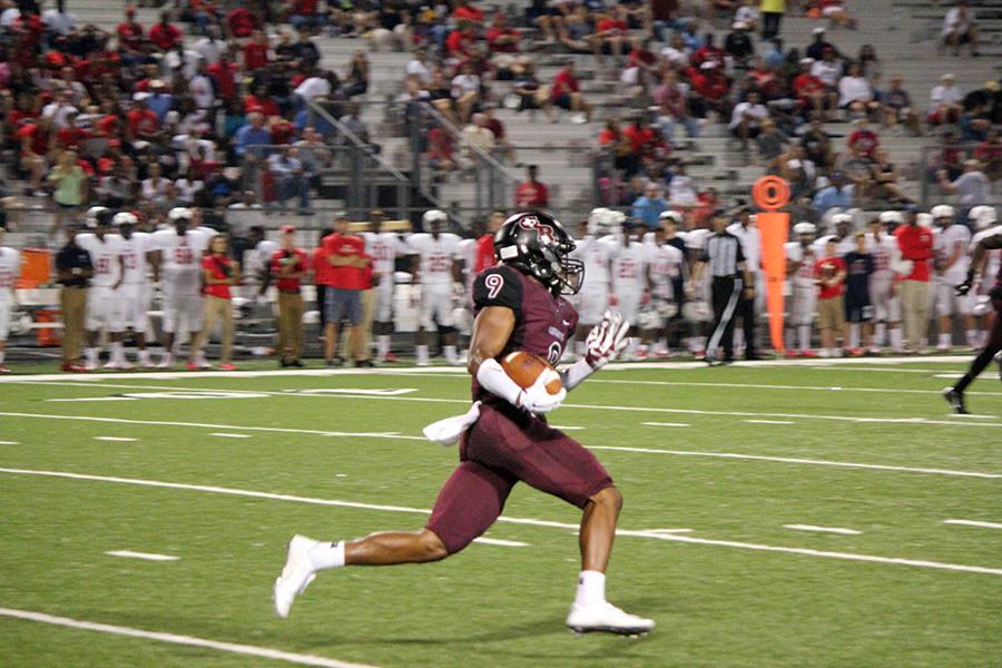 Longhorns storm the field