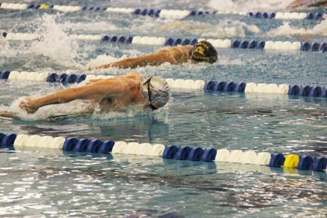 Senior David Kvinta extends his lead in the butterfly race.