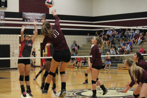 Ainsley Mandell successfully scores a point for her team with a kill.