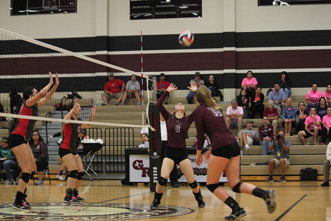 Abbey Messick makes an assist and sets up her middle.