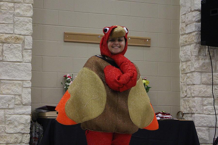Demi Sadek representing Thanksgiving as a turkey, corrdinationg with her groups theme of Holidays.