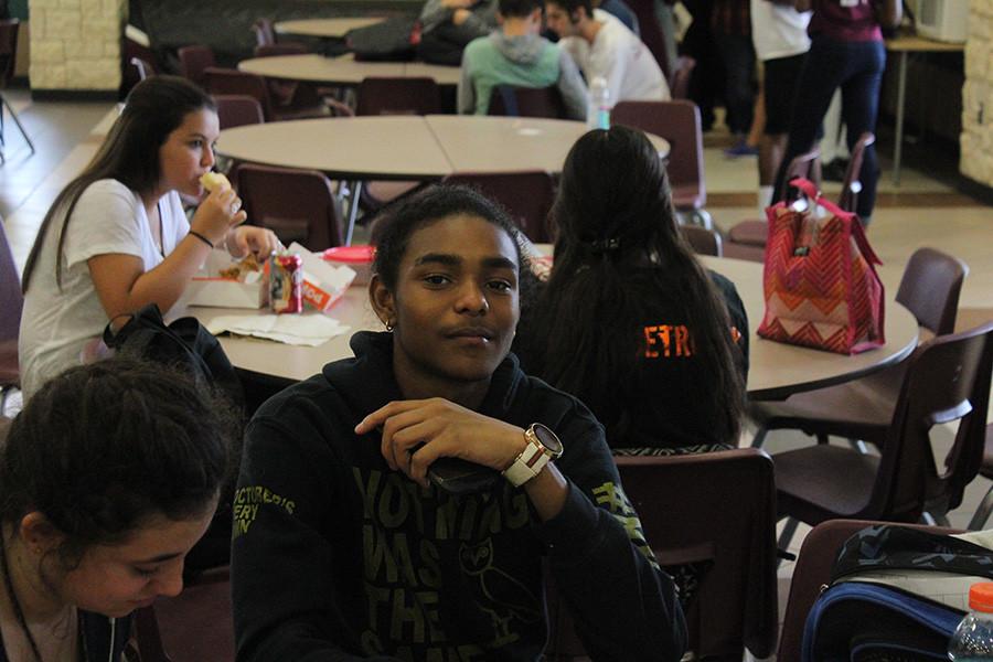 student takes selfie at lunch 