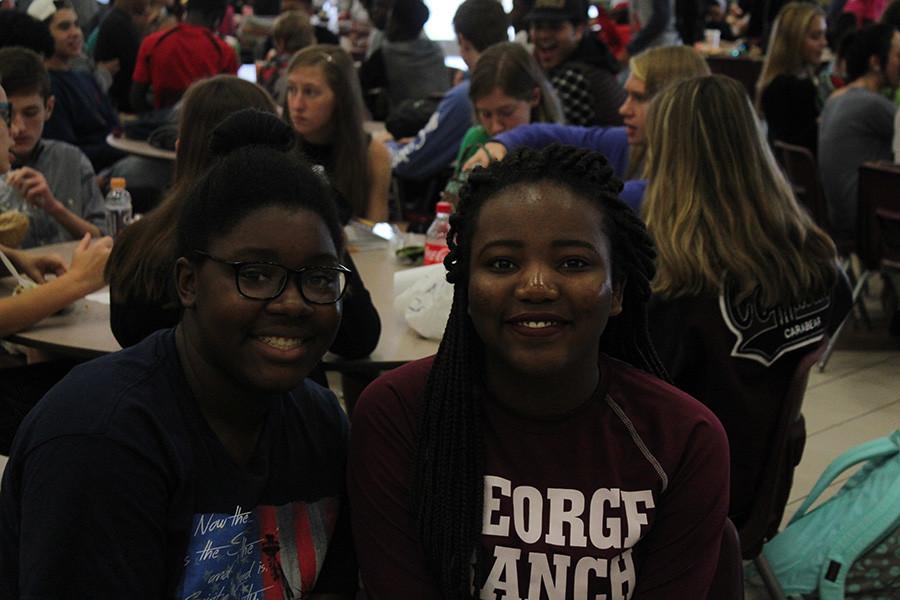 good friends take a picture together at lunch