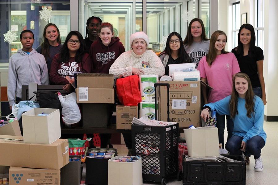 From left to right (front)  Xavier Boykin, Andrea Jimenez, Amanda Crow, Mrs. Tana Holmes, An Pham, Kiana Barrigan, Grace Nguyen. Kneeling is Lauren Telford, Lauren Burkett is behind Kiana and An, Abisola Harris is at the far back. The young woman in the rear left is the Houston Humane Society representative Monica Schmidt. 