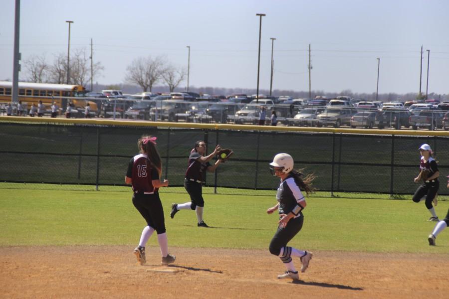 Kayte Martinez catches a pop-up to center field. 