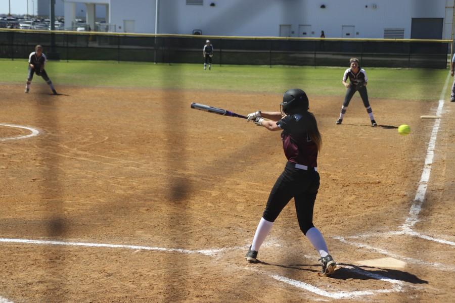 Destiny Walker swings at a rise ball. 