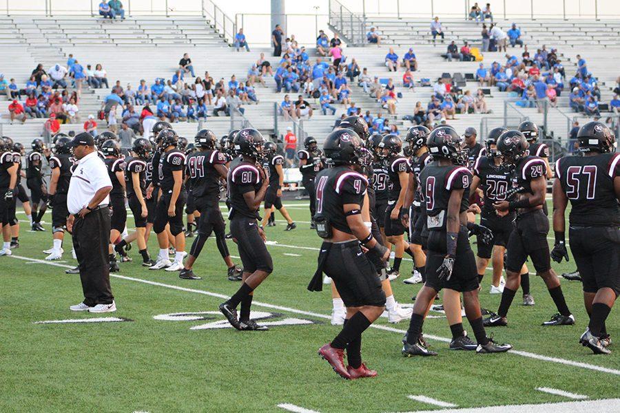 Longhorns varsity Football Team mentally and physically get set for the game.