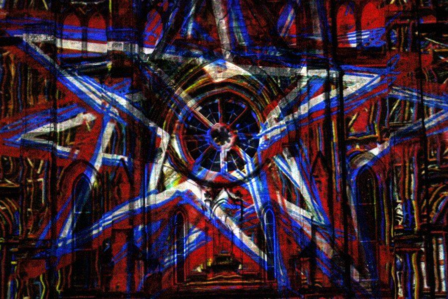 Stars appearing in red, white, and blue on a San Antonio Cathedral 