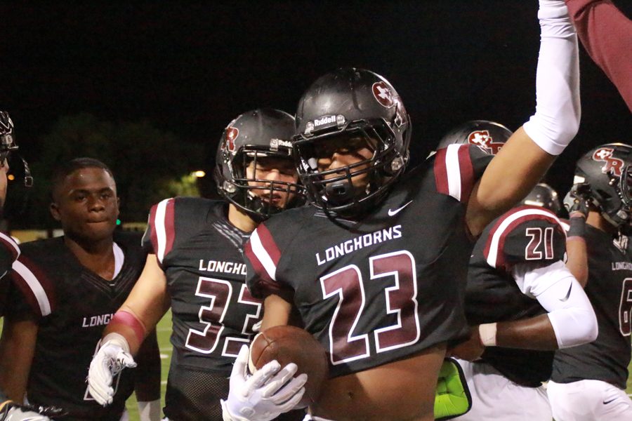 Samuel Barnes comes on the sideline after he gets a interception.