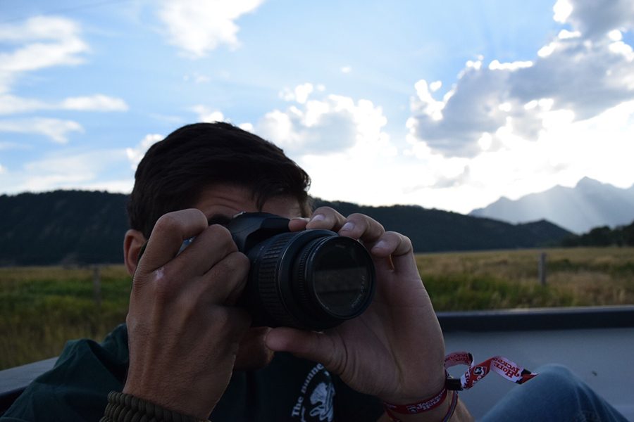 Nicholas Castillo taking a picture in Jackson Hole, Wyoming. 