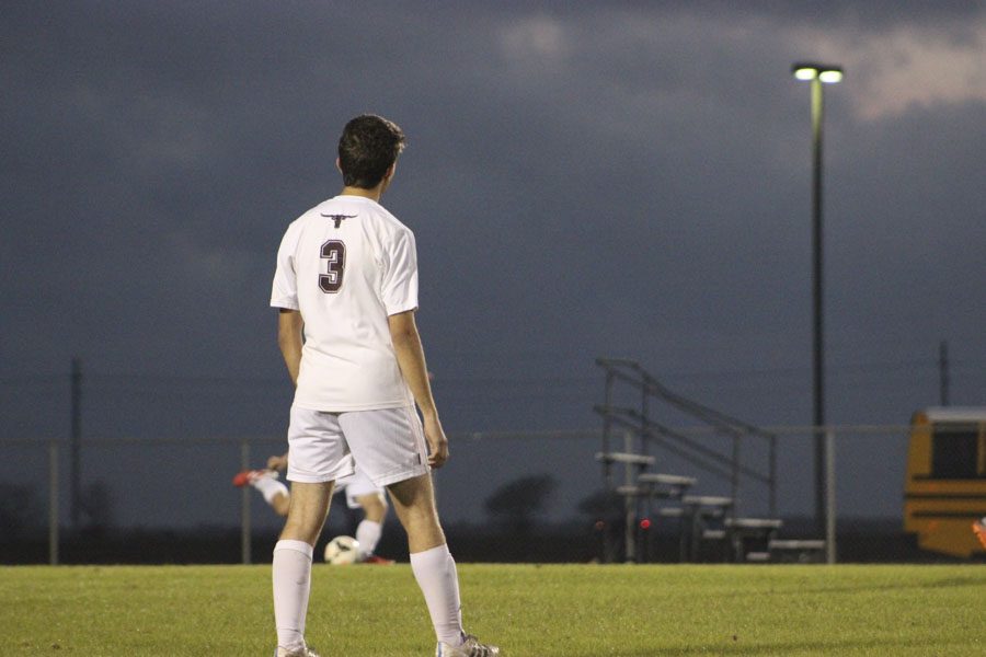 Number 3 waits for the ball and stays in his zone.