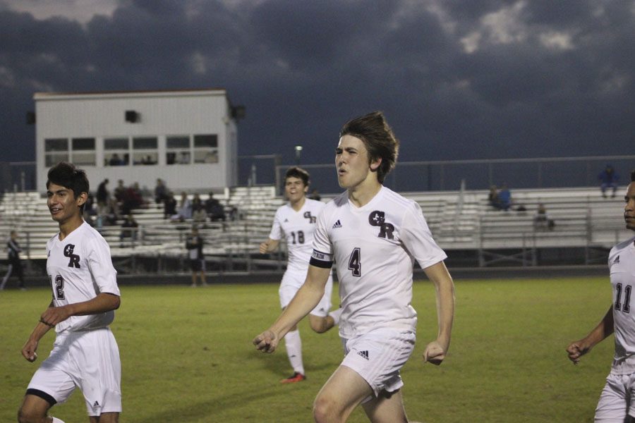 JV boys are thrilled they scored a goal. 