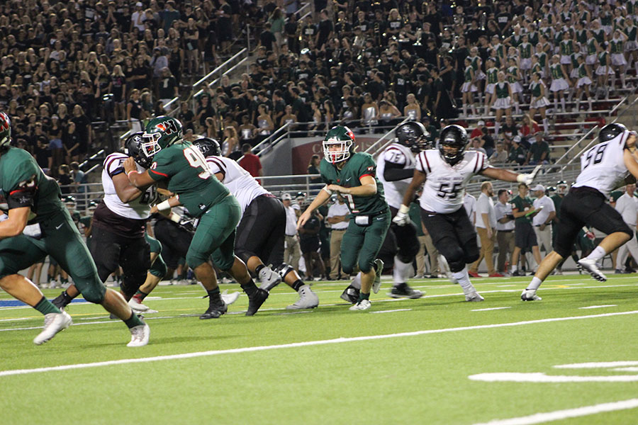 The Woodlands and George Ranch begin the game with fierce determination