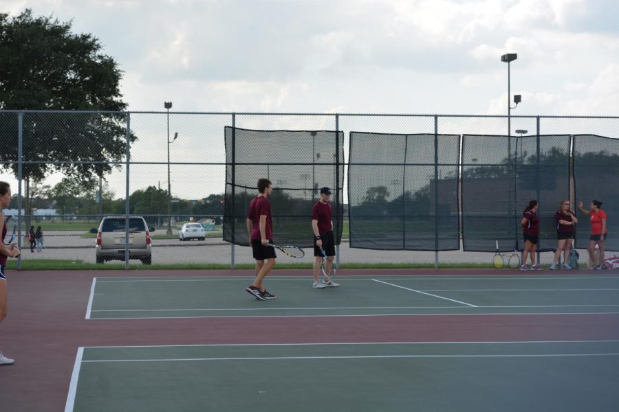 Adam Czernuszenko and Thomas Thaxton warm up before their match.