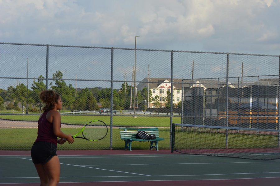 Nicole Brandborg prepares for the ball to arrive in her court.