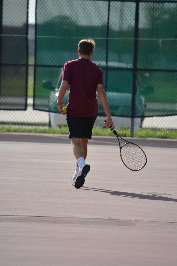 Daniel Pate exits the court after the end of his match.