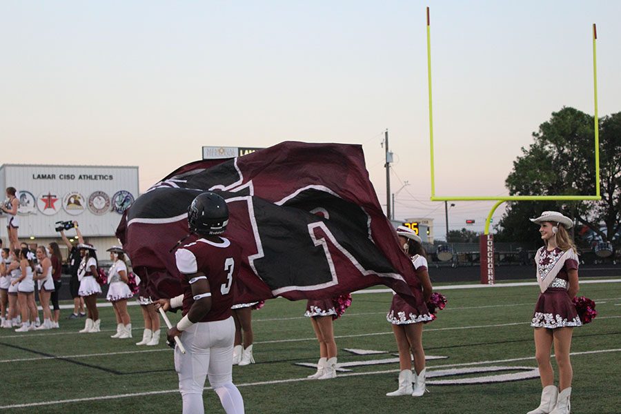 David Fisher pumps up the team as they run out.