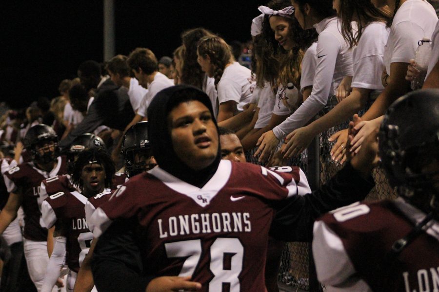 Josh is out with an concussion but is still supporting the Longhorns. 