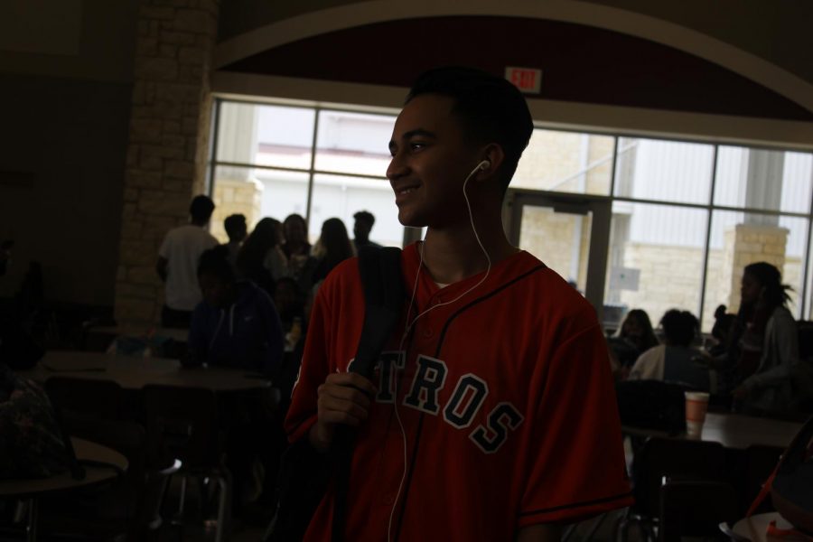 Aaron Huerta looks out the window 