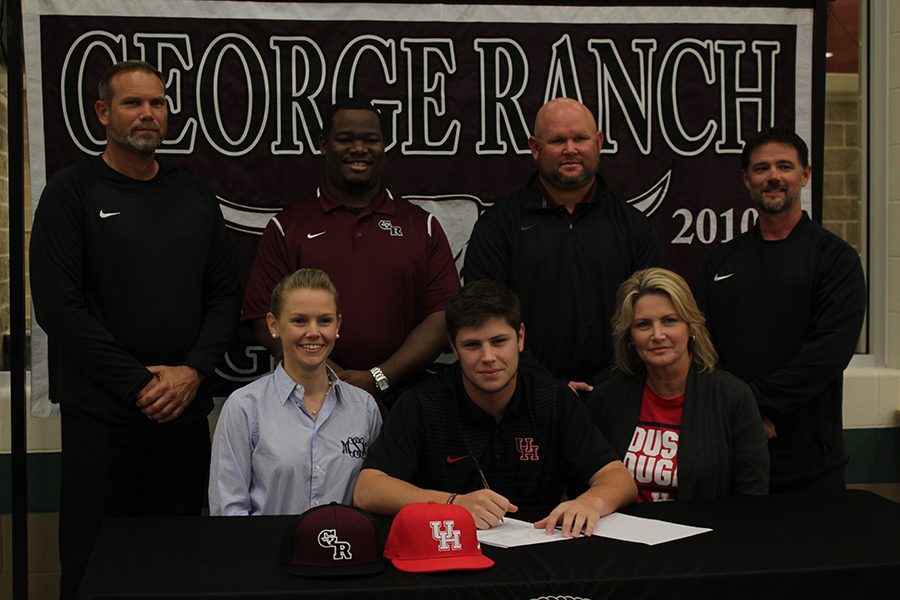 Ty Abraham signs his way into the University of Houston. 