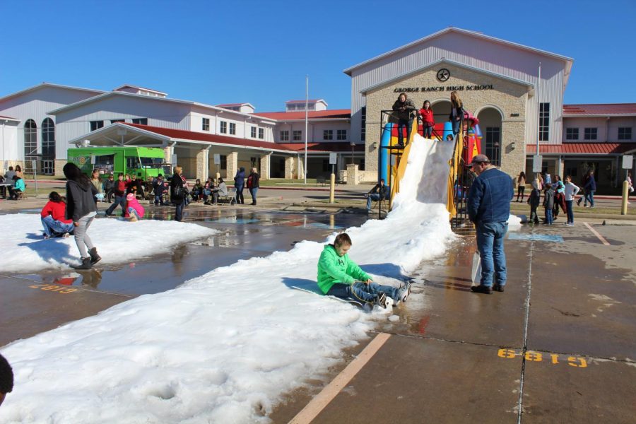 The Winter Wonderland at the Ranch is complete with imported snow, snow slides, and bouncy castles. 