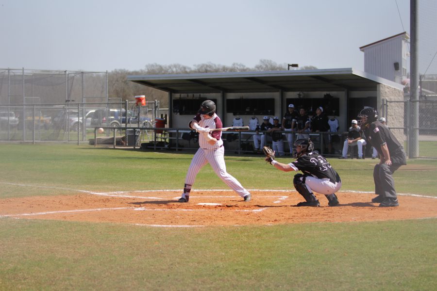 Designated Hitter Joseph Menefee swings at a high fastball