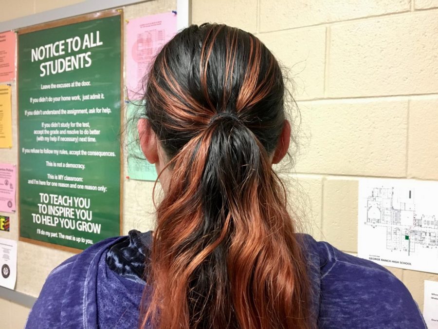 A student with dyed hair.