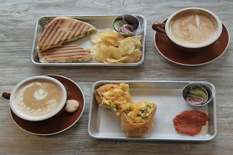 Top left is the Caprese Panini served with chips, and bottom right is The Egg served with some type of salsa. 