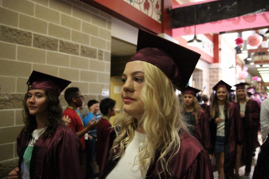 Ashley Green looks around and remembers that she went through all of this as a 6th grader.