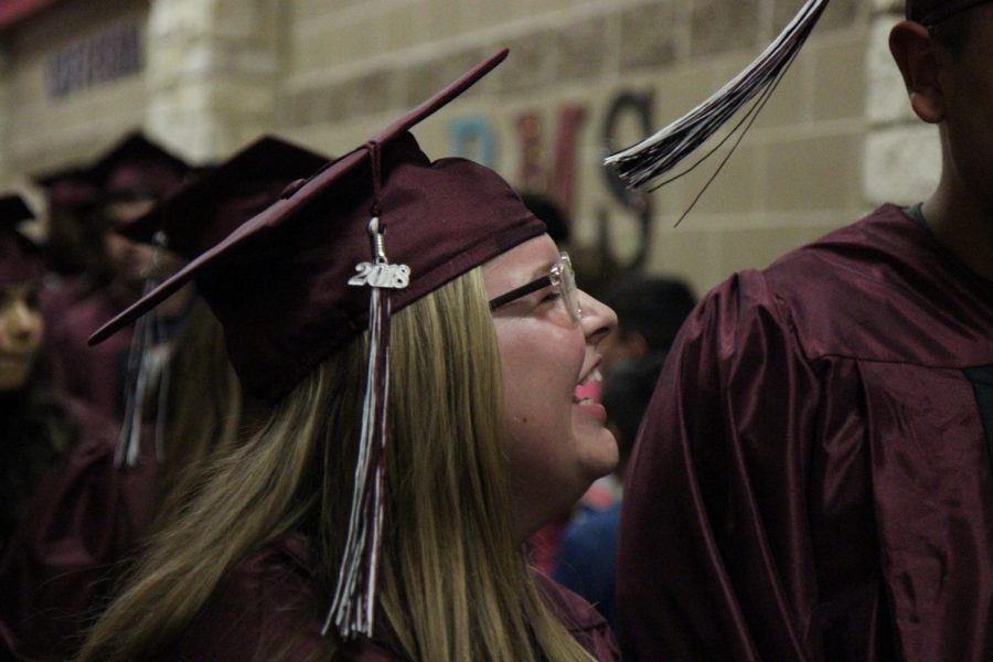 Brilee Erdeljac laughs with her friends, remembering the good times.