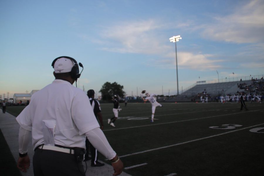 Coach Cavallo snaps as the quater back throws a bit to close to the defender.