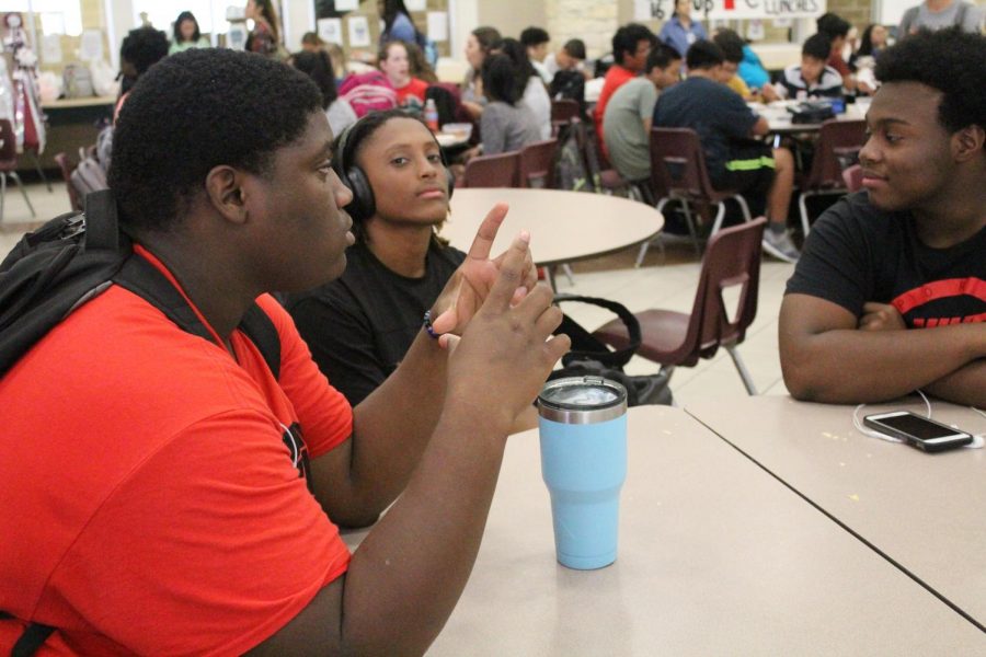 Tony Harris (11), Bryce Dotson (11), and Malcolm Harper (11) hang out during C-Lunch.