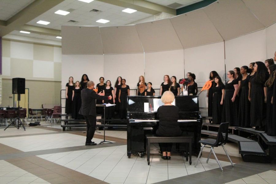 Varsity chorale and Mr. Williams conducting.