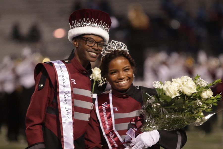 Jalen Archer (12) and Faith Jordan (12) smiling from cheek to cheek after finding out the both of them won.