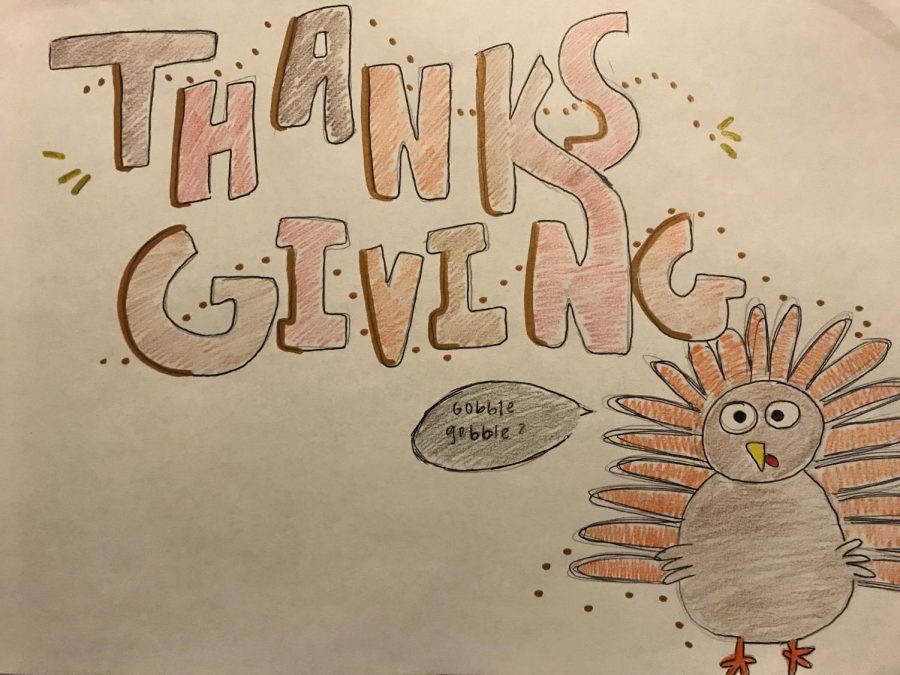 A+Thanksgiving+drawing+with+a+cartoon+of+a+turkey.