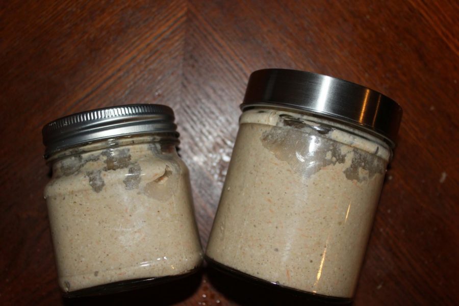 The freshly made porridge speckles with pieces of carrot against the flavorful pale oatmeal!