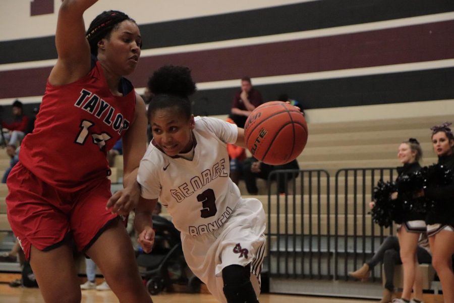 Savannah Velasquez (9) dribbling around her defender to get the 2.