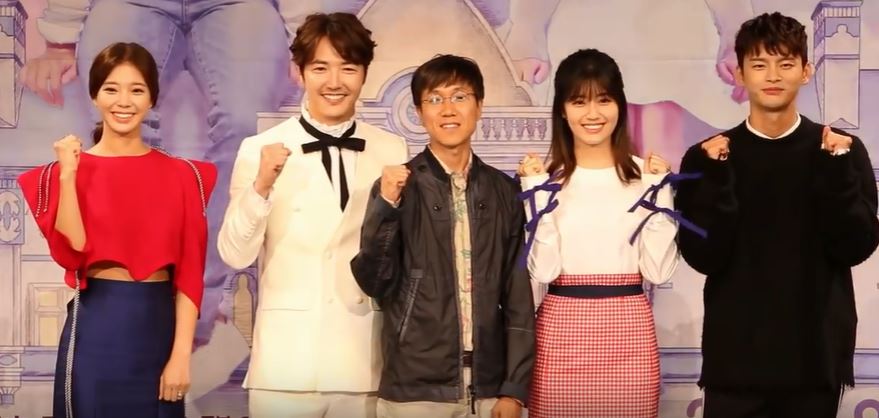 The cast of popular k-drama, Shopping King Louie, poses for a group picture at a press conference. 