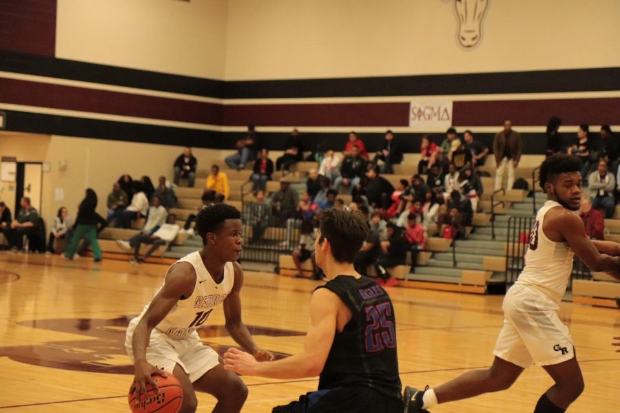 Chübby Uchenna (10) meeting up with a guard from the opposite team.