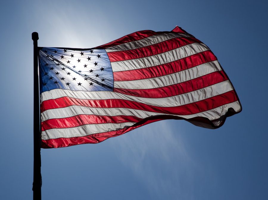 An American flag blowing in the wind