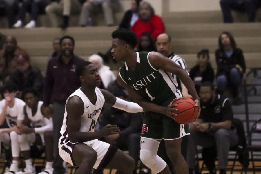 Dalon Dean 12th grade trying to stop the Strake Jesuit from scoring.