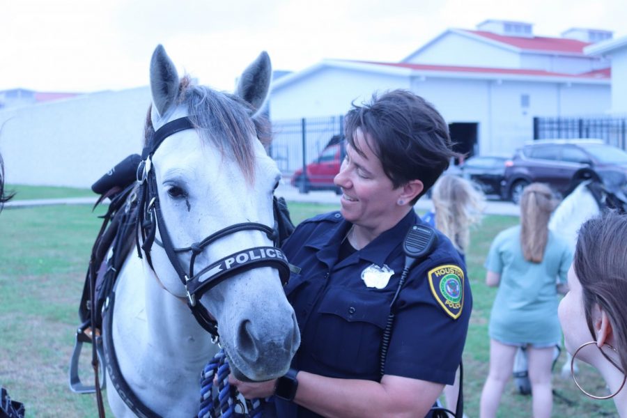 Another female officer and her horse.